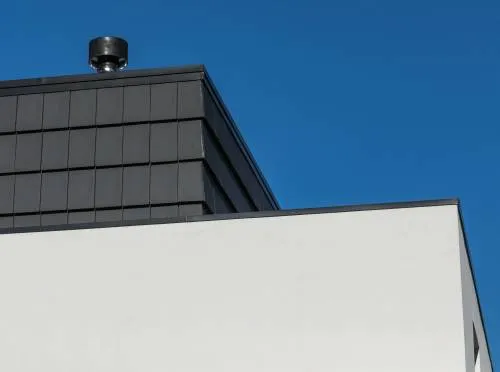 Telha Lógica®Plana no telhado e na fachada de moradia no distrito do Porto
